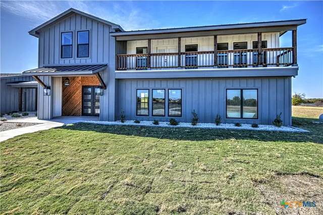 a house view with a garden space