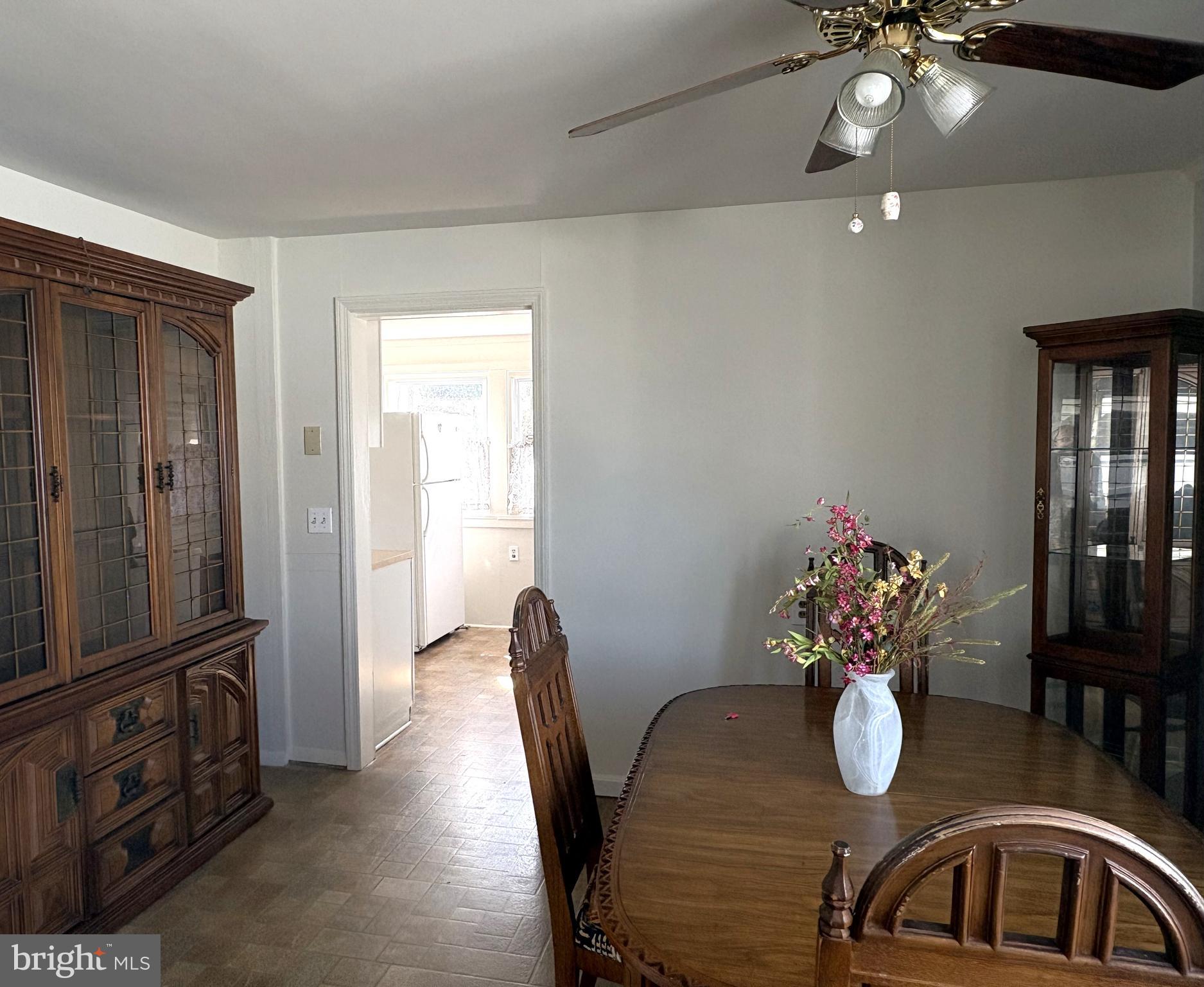 115 Compass Road Baltimore, MD 21220 - Photo 8 of 13 a view of a dining room with furniture