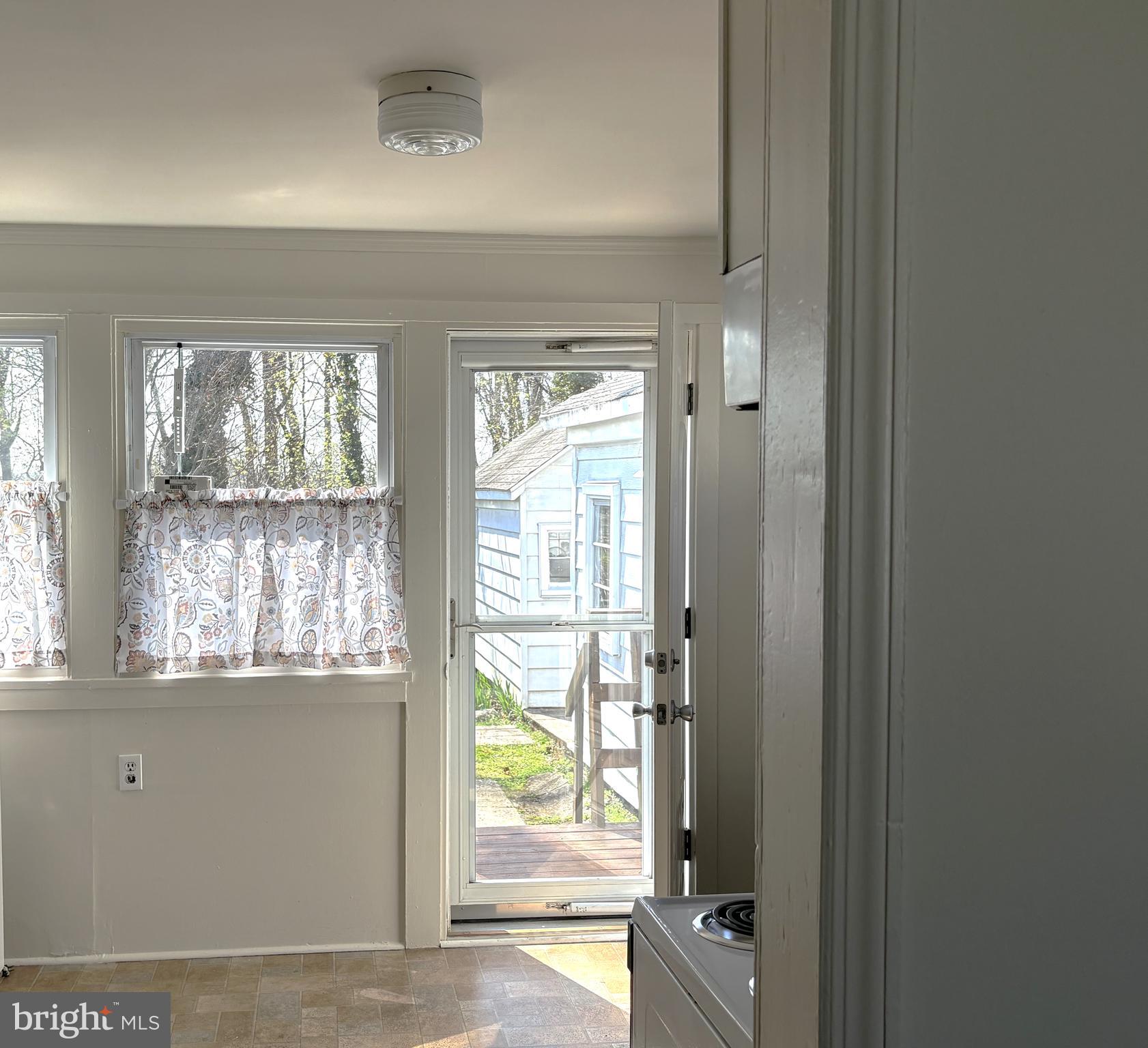 115 Compass Road Baltimore, MD 21220 - Photo 10 of 14 Backdoor out of kitchen