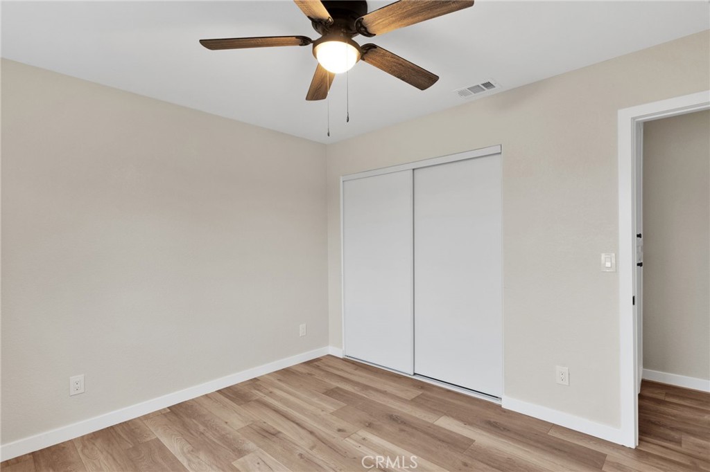 12532 Sholic Road Apple Valley, CA 92308 - Photo 30 of 41 a view of an empty room