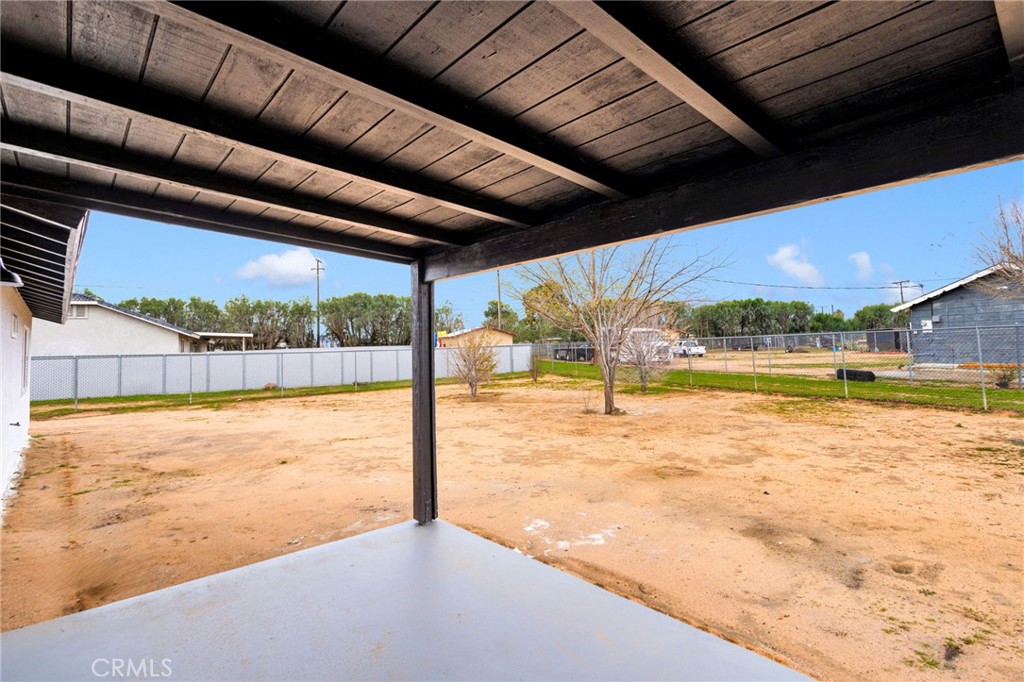 12532 Sholic Road Apple Valley, CA 92308 - Photo 37 of 41 a view of swimming pool with outdoor seating