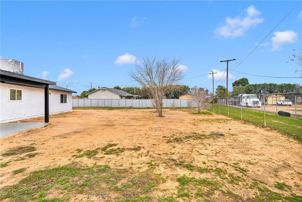 12532 Sholic Road Apple Valley, CA 92308 - Photo 39 of 41 a bathroom with a bathtub and shower