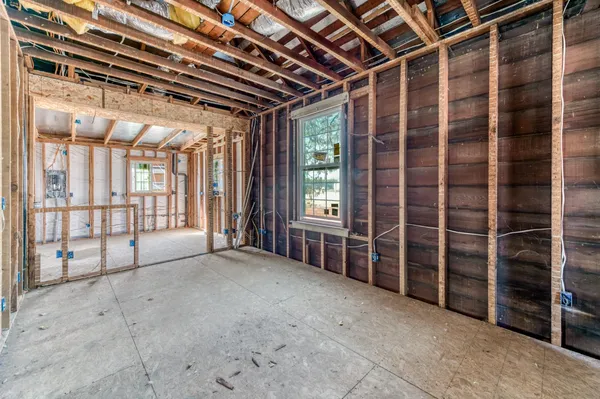 a view of a room with wooden walls