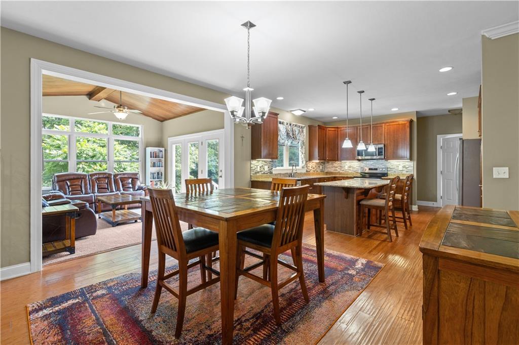 242 Kings Road Washington, PA 15301 - Photo 13 of 42 a view of a dining room with furniture window and wooden floor