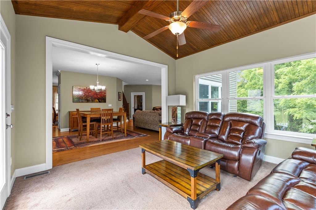 242 Kings Road Washington, PA 15301 - Photo 19 of 42 a living room with furniture a ceiling fan and a large window