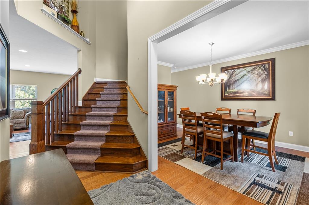 242 Kings Road Washington, PA 15301 - Photo 25 of 42 a view of a dining room with furniture entryway and wooden floor