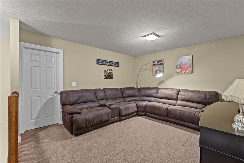 242 Kings Road Washington, PA 15301 - Photo 30 of 42 a living room with furniture and a couch