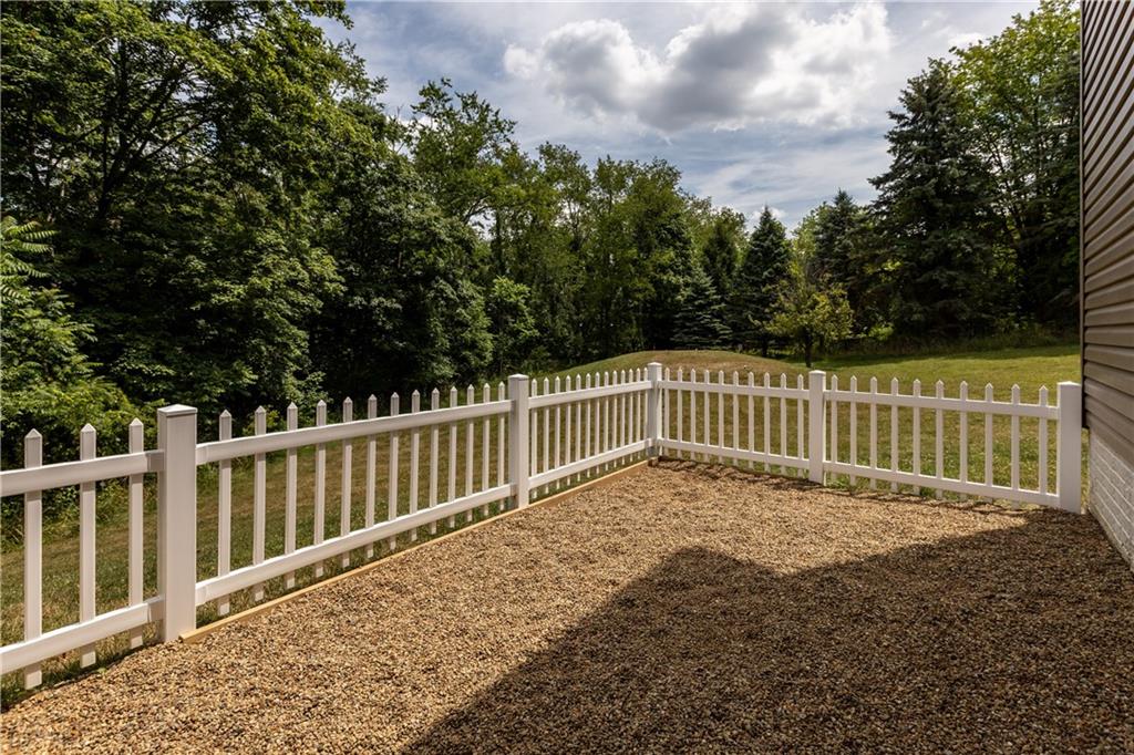 242 Kings Road Washington, PA 15301 - Photo 34 of 42 a view of a fence with trees in the background
