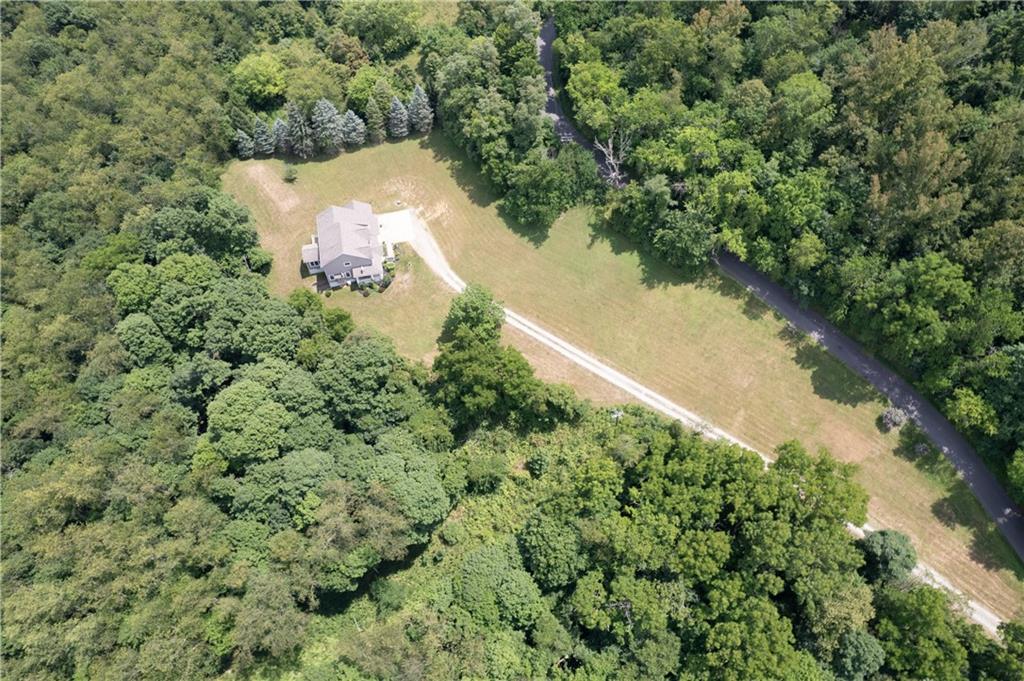 242 Kings Road Washington, PA 15301 - Photo 4 of 42 an aerial view of a house with a yard and lake view
