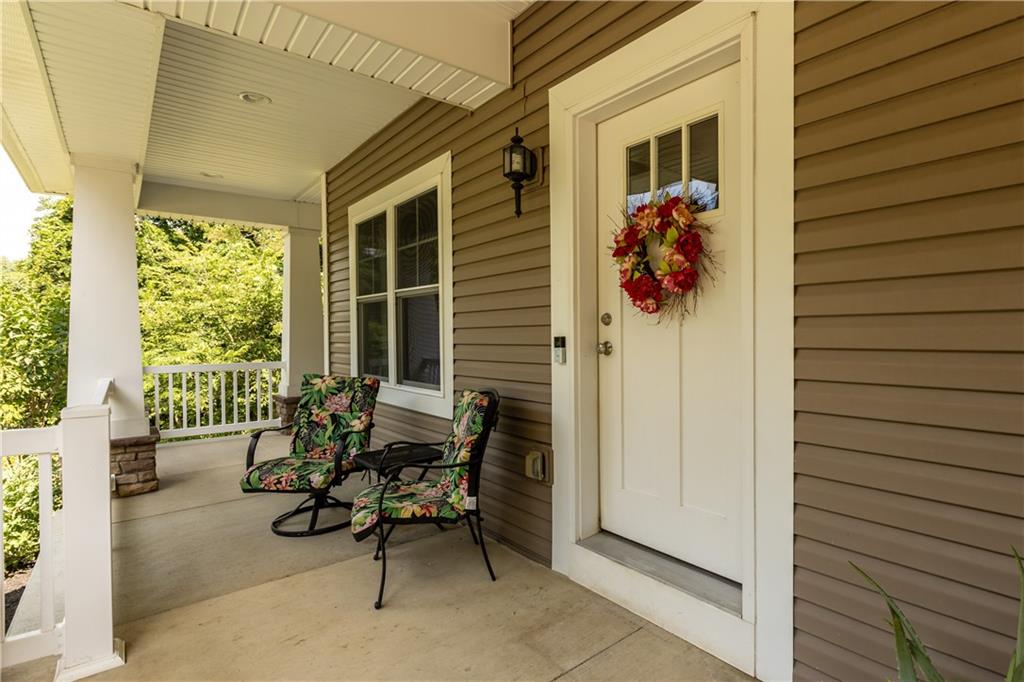 242 Kings Road Washington, PA 15301 - Photo 6 of 42 a building outdoor space with patio furniture and potted plants