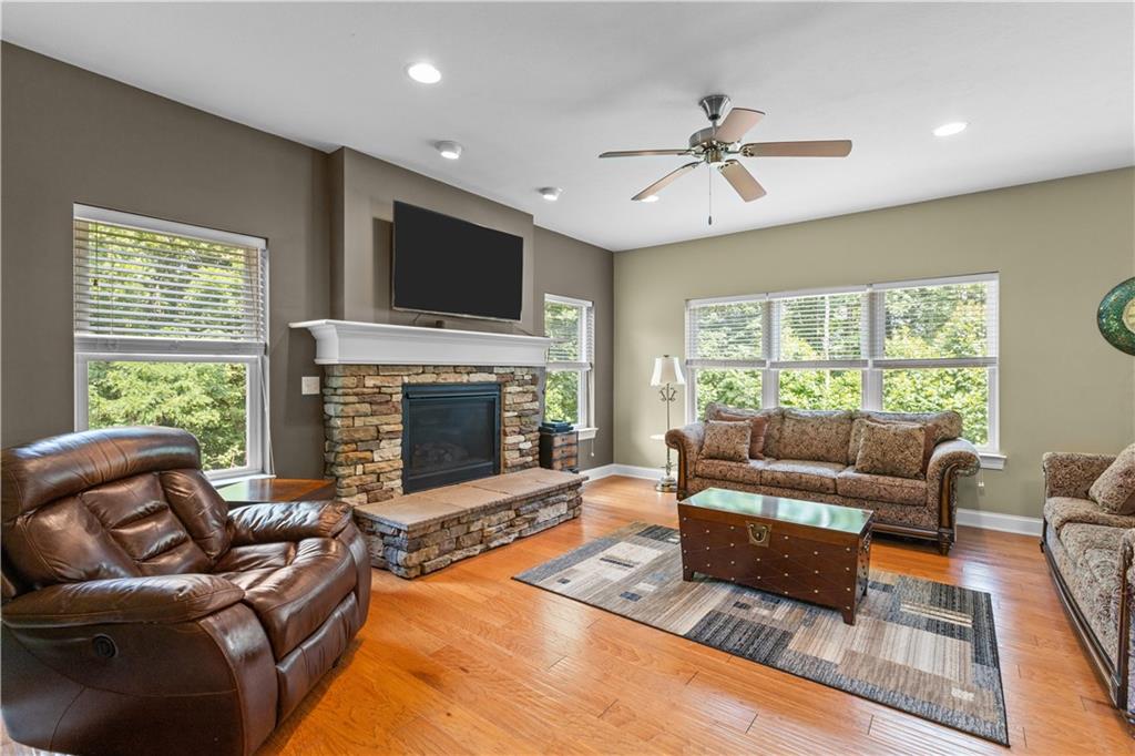 242 Kings Road Washington, PA 15301 - Photo 8 of 42 a living room with furniture fireplace and a flat screen tv