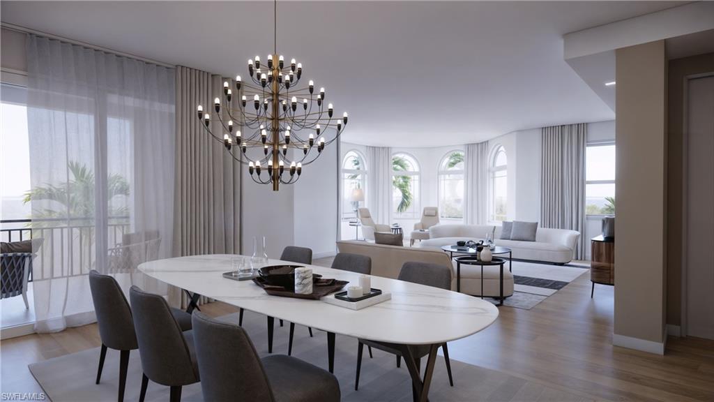 1301 3rd Avenue South, Unit PHW Naples, FL 34102 - Photo 6 of 22 a view of a dining room with furniture window and wooden floor