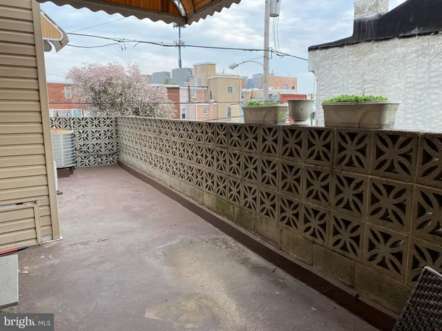 a terrace with a city view