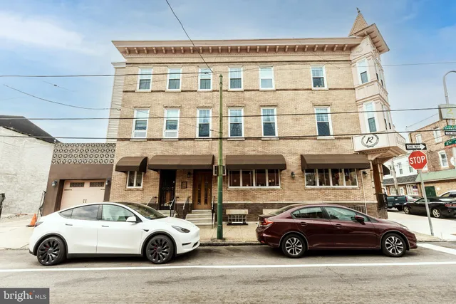 a car parked in front of a building