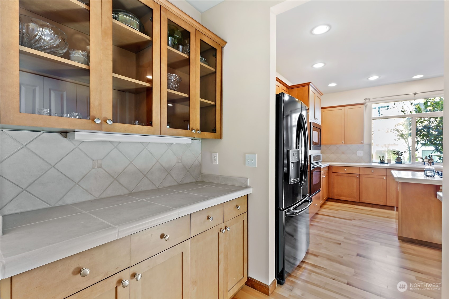 133 185th Place Southwest Bothell, WA 98012 - Photo 13 of 32 a kitchen with stainless steel appliances granite countertop a refrigerator and a sink