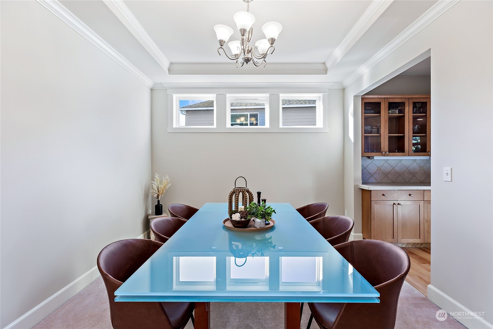 133 185th Place Southwest Bothell, WA 98012 - Photo 15 of 32 a view of a dining room with furniture and chandelier