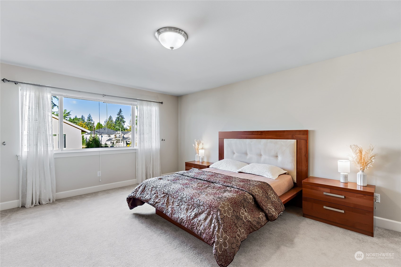 133 185th Place Southwest Bothell, WA 98012 - Photo 19 of 32 a bedroom with a bed and a window