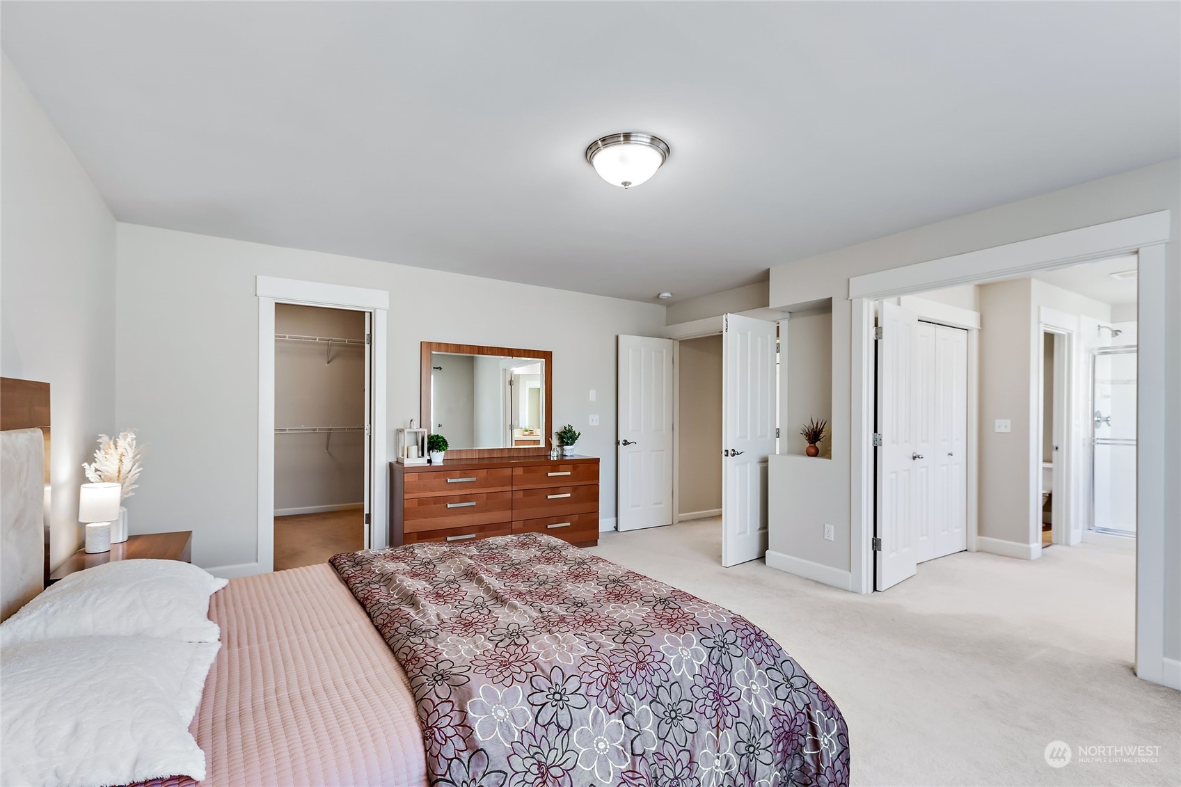 133 185th Place Southwest Bothell, WA 98012 - Photo 20 of 32 a bedroom with a bed and dresser