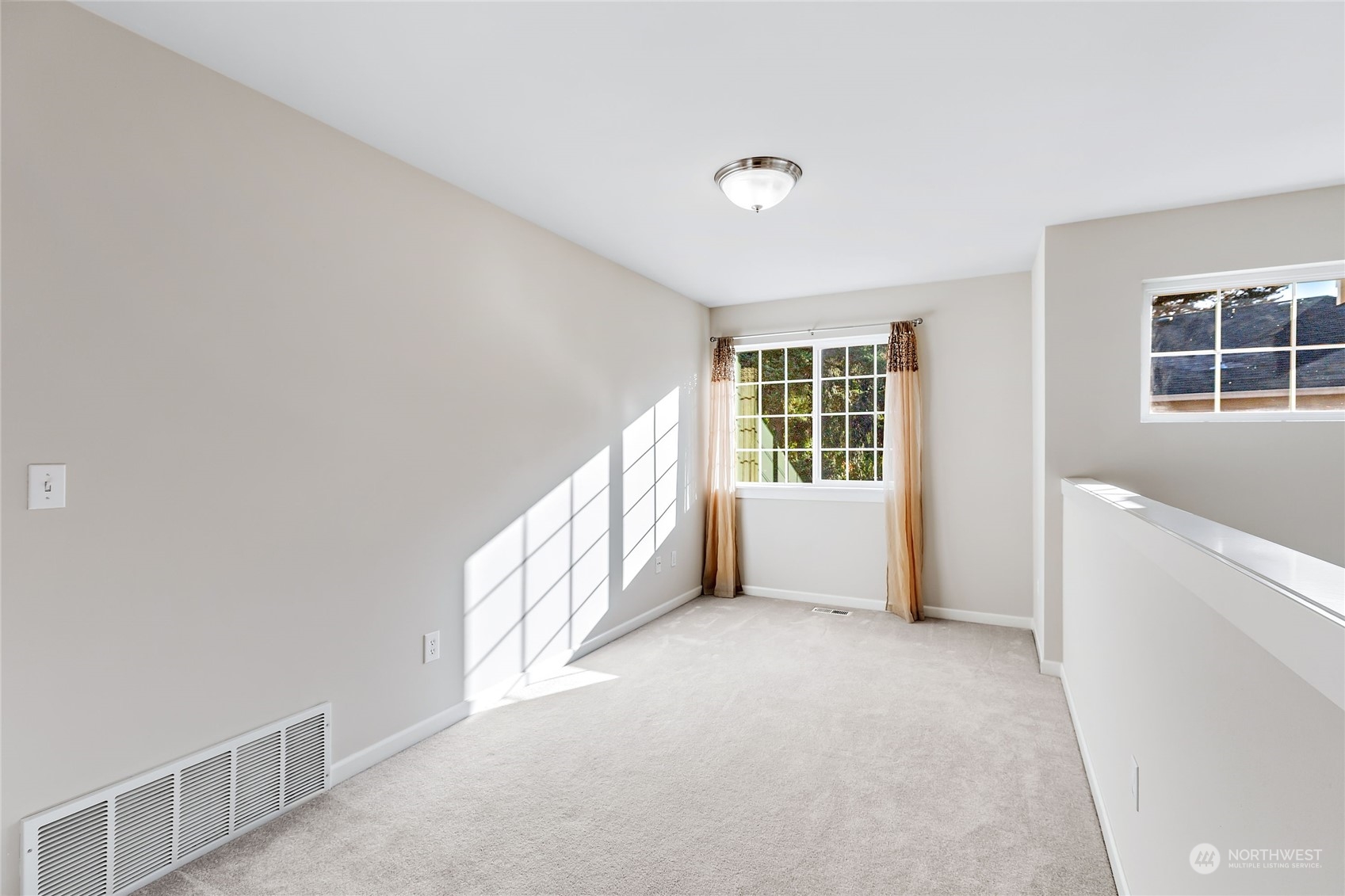 133 185th Place Southwest Bothell, WA 98012 - Photo 23 of 32 a view of an empty room with a window