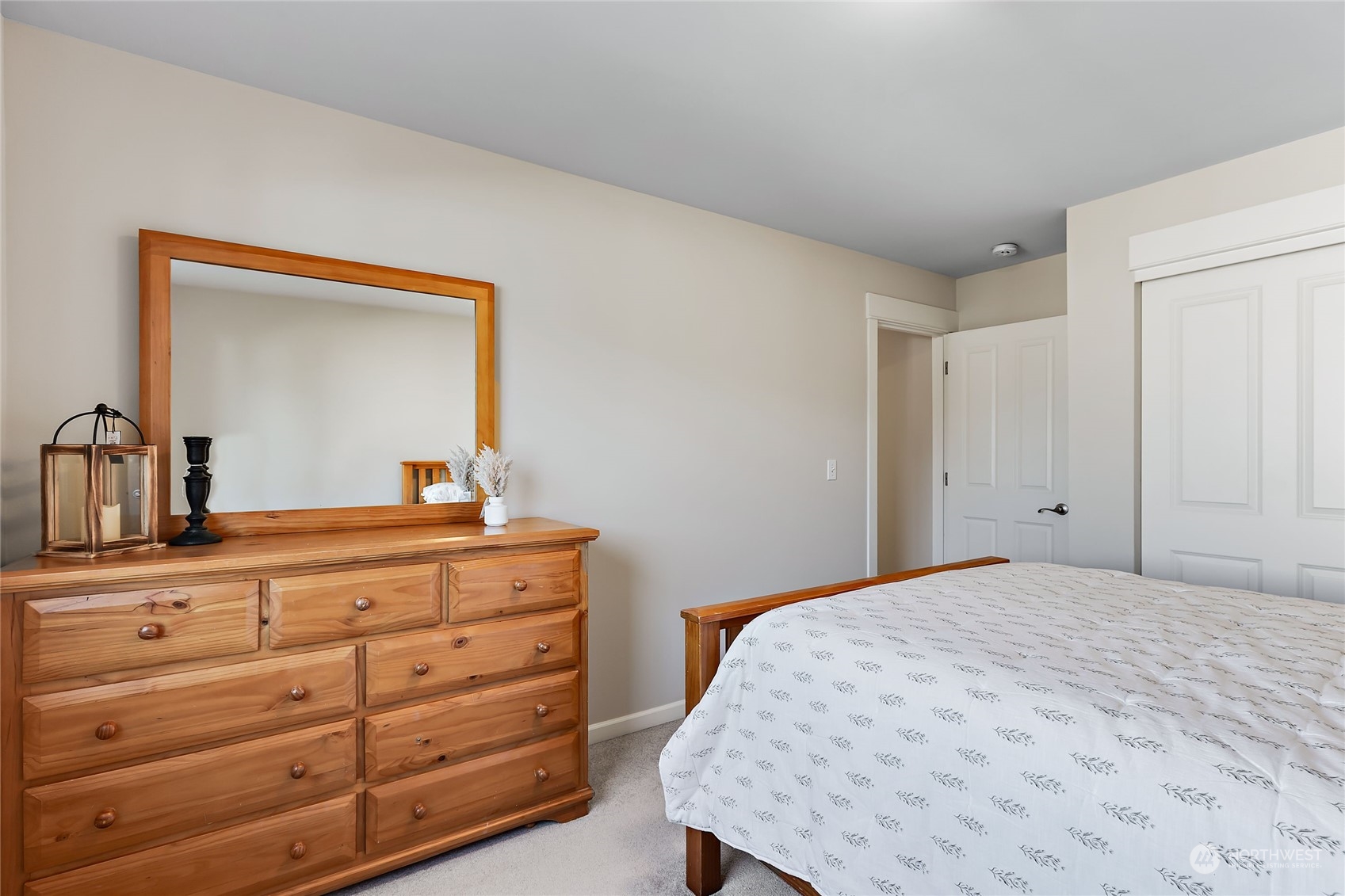 133 185th Place Southwest Bothell, WA 98012 - Photo 26 of 32 a bedroom with a bed and a dresser