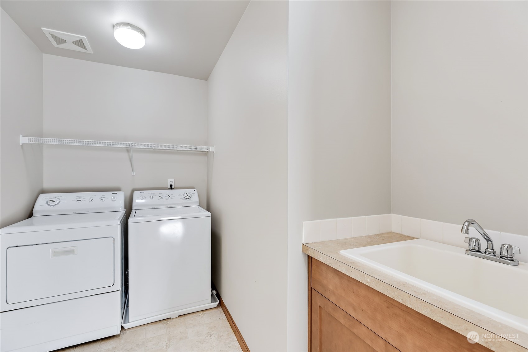 133 185th Place Southwest Bothell, WA 98012 - Photo 29 of 32 a utility room with dryer and washer