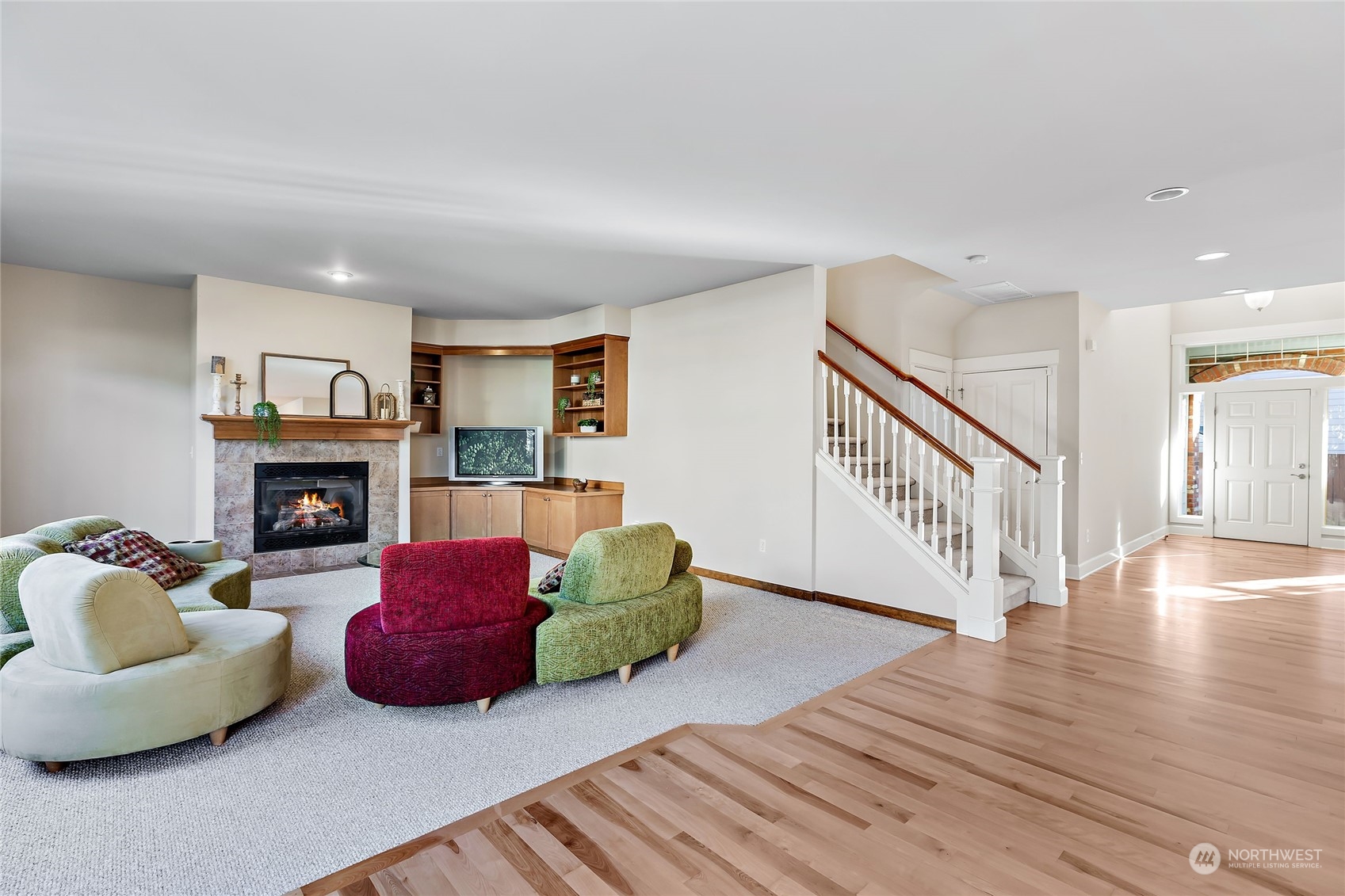 133 185th Place Southwest Bothell, WA 98012 - Photo 4 of 32 a living room with furniture and a fireplace