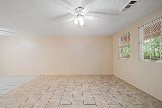 a kitchen with a sink cabinets and window