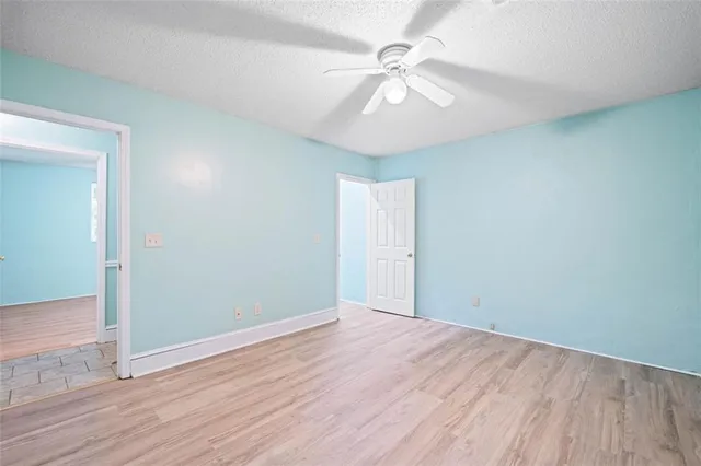 a bathroom with a sink toilet and a mirror
