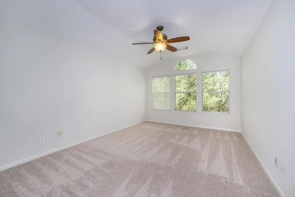 $319,500 | 158 North Magnolia Pond Place, Unit 158E, The Woodlands, TX 77381