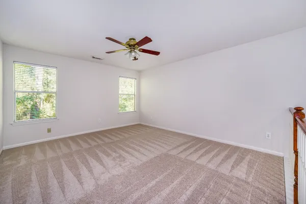 $319,500 | 158 North Magnolia Pond Place, Unit 158E, The Woodlands, TX 77381