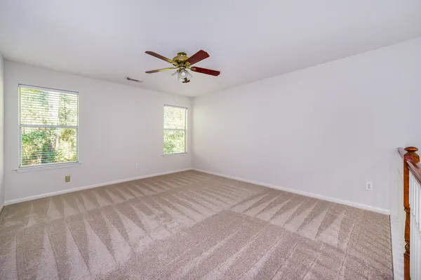 $319,500 | 158 North Magnolia Pond Place, Unit 158E, The Woodlands, TX 77381