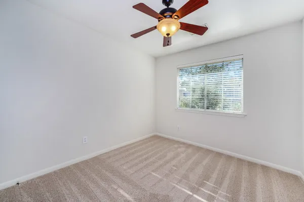 $319,500 | 158 North Magnolia Pond Place, Unit 158E, The Woodlands, TX 77381