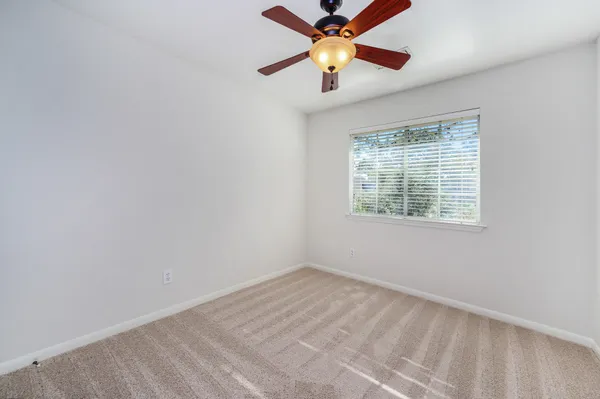 $319,500 | 158 North Magnolia Pond Place, Unit 158E, The Woodlands, TX 77381