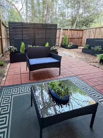 $319,500 | 158 North Magnolia Pond Place, Unit 158E, The Woodlands, TX 77381