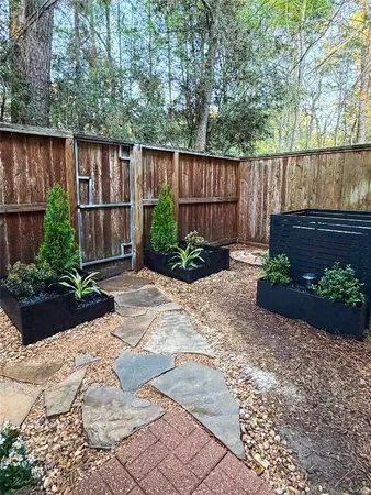 $319,500 | 158 North Magnolia Pond Place, Unit 158E, The Woodlands, TX 77381