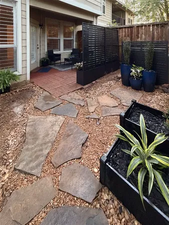 $319,500 | 158 North Magnolia Pond Place, Unit 158E, The Woodlands, TX 77381