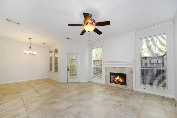 $319,500 | 158 North Magnolia Pond Place, Unit 158E, The Woodlands, TX 77381