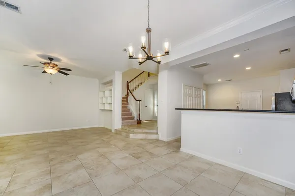 $319,500 | 158 North Magnolia Pond Place, Unit 158E, The Woodlands, TX 77381