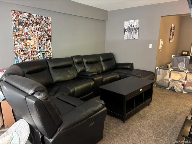 a living room with furniture and a couch