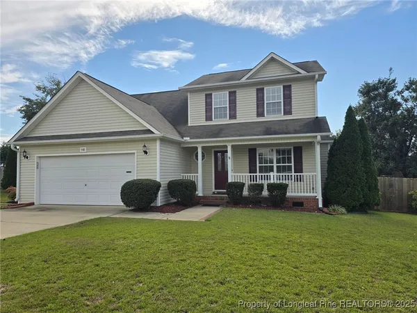 a house view with a garden space