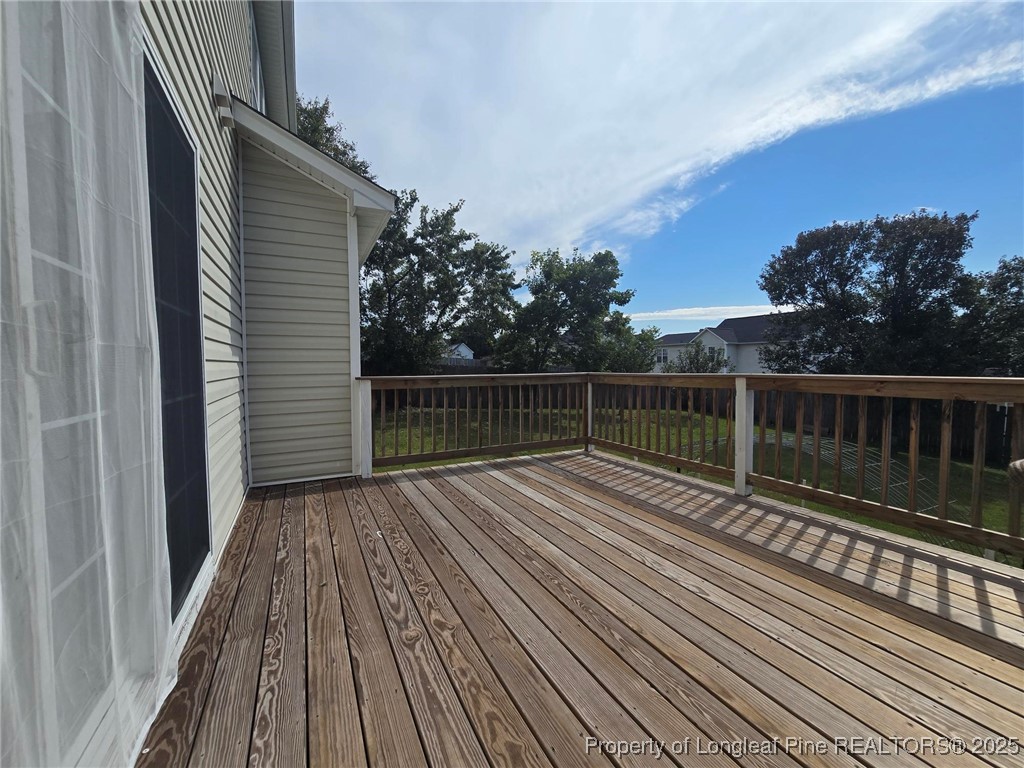 115 Haywood Street Spring Lake, NC 28390 - Photo 23 of 35 a view of balcony with wooden floor