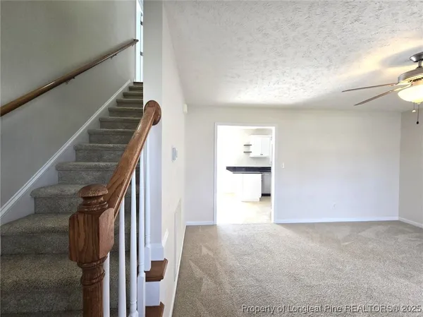 a view of an entryway with stairs