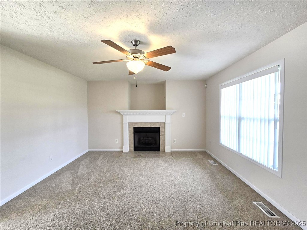 115 Haywood Street Spring Lake, NC 28390 - Photo 4 of 35 a view of an empty room with a window
