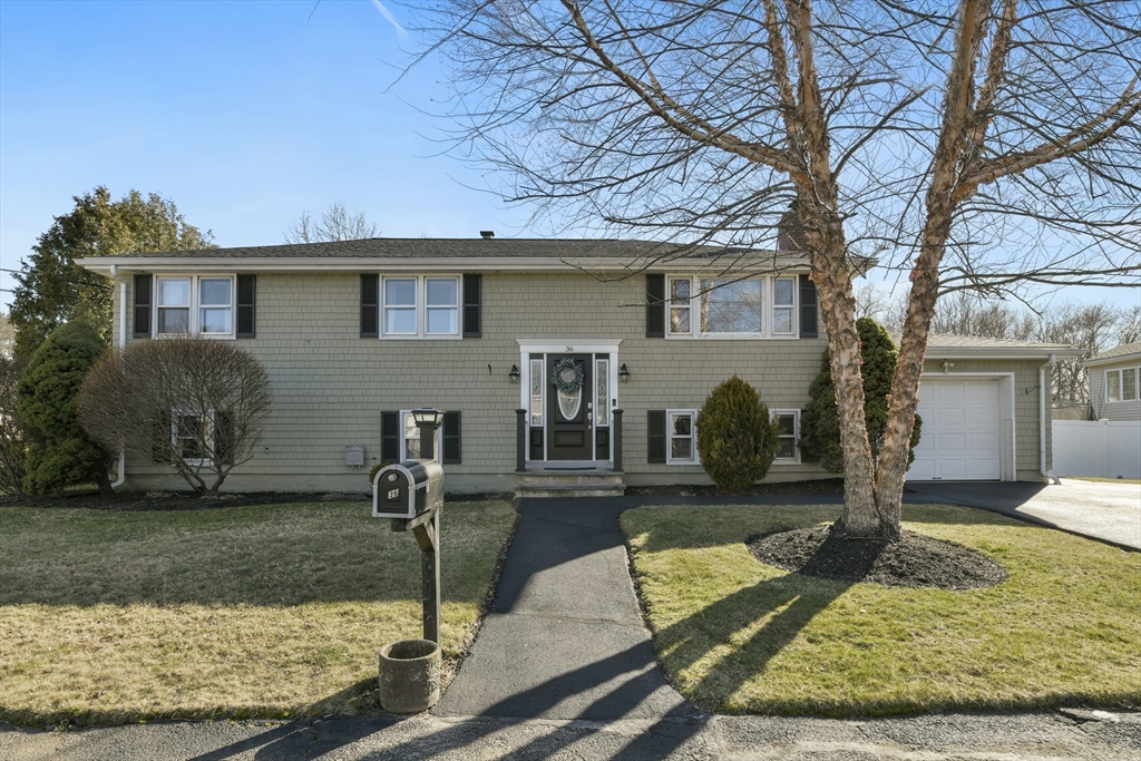 36 Taft Avenue Beverly, MA 01915 - Photo 1 of 36 a front view of a house with garden