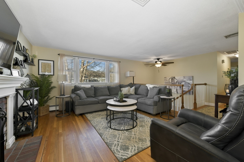 36 Taft Avenue Beverly, MA 01915 - Photo 11 of 36 a living room with furniture and wooden floor