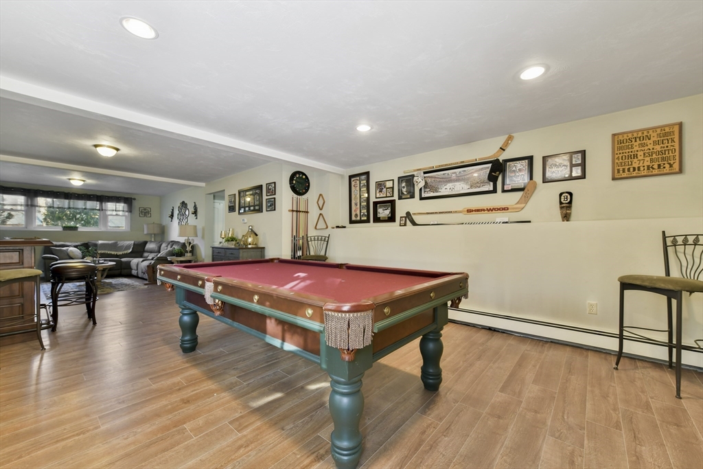 36 Taft Avenue Beverly, MA 01915 - Photo 18 of 36 a room with furniture pool table and wooden floor