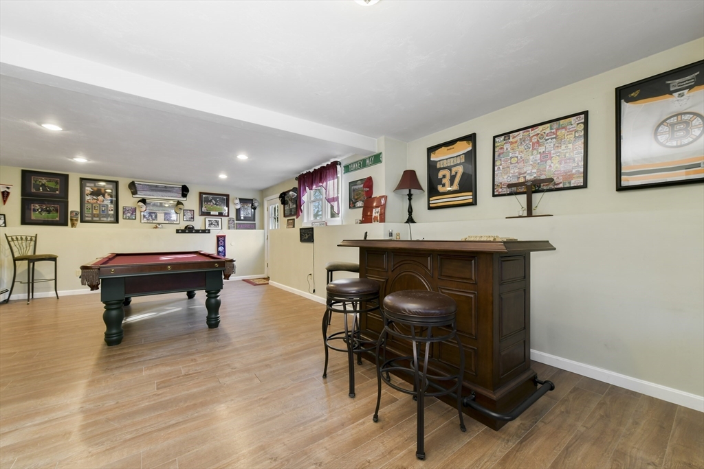 36 Taft Avenue Beverly, MA 01915 - Photo 20 of 36 a living room with furniture and a piano