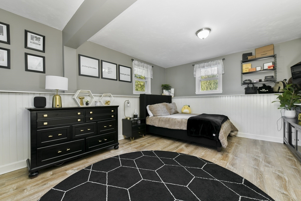 36 Taft Avenue Beverly, MA 01915 - Photo 21 of 36 a bedroom with a bed and a dresser