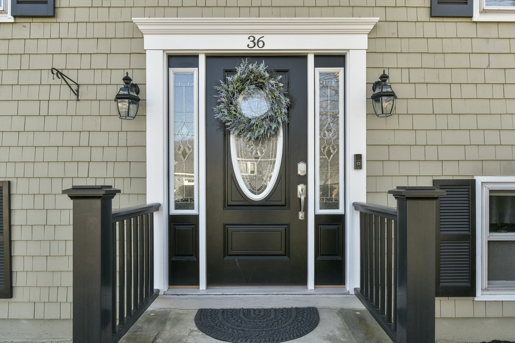 36 Taft Avenue Beverly, MA 01915 - Photo 35 of 36 a front view of a house with a door