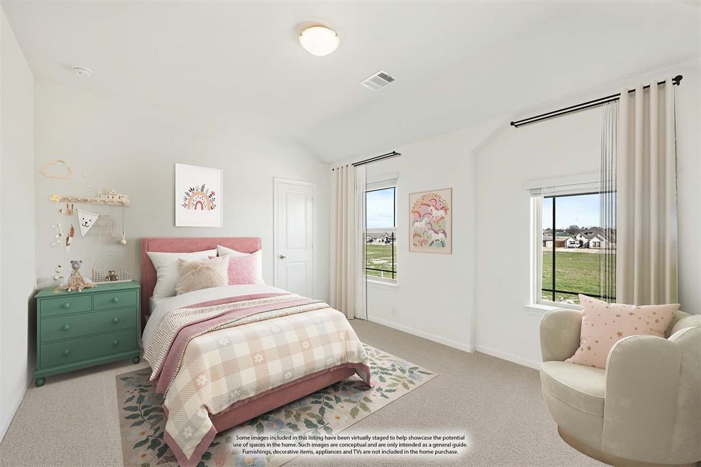 4541 Norcross Lane Crowley, TX 76036 - Photo 16 of 20 a bedroom with a bed couch and window